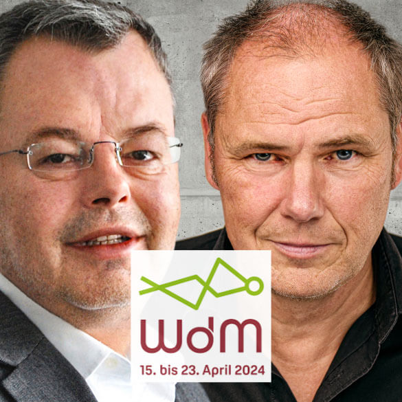 Dr. Uwe Lebok und Dr. Harald Berens mit dem Logo der Woche der Marktforschung 2024.