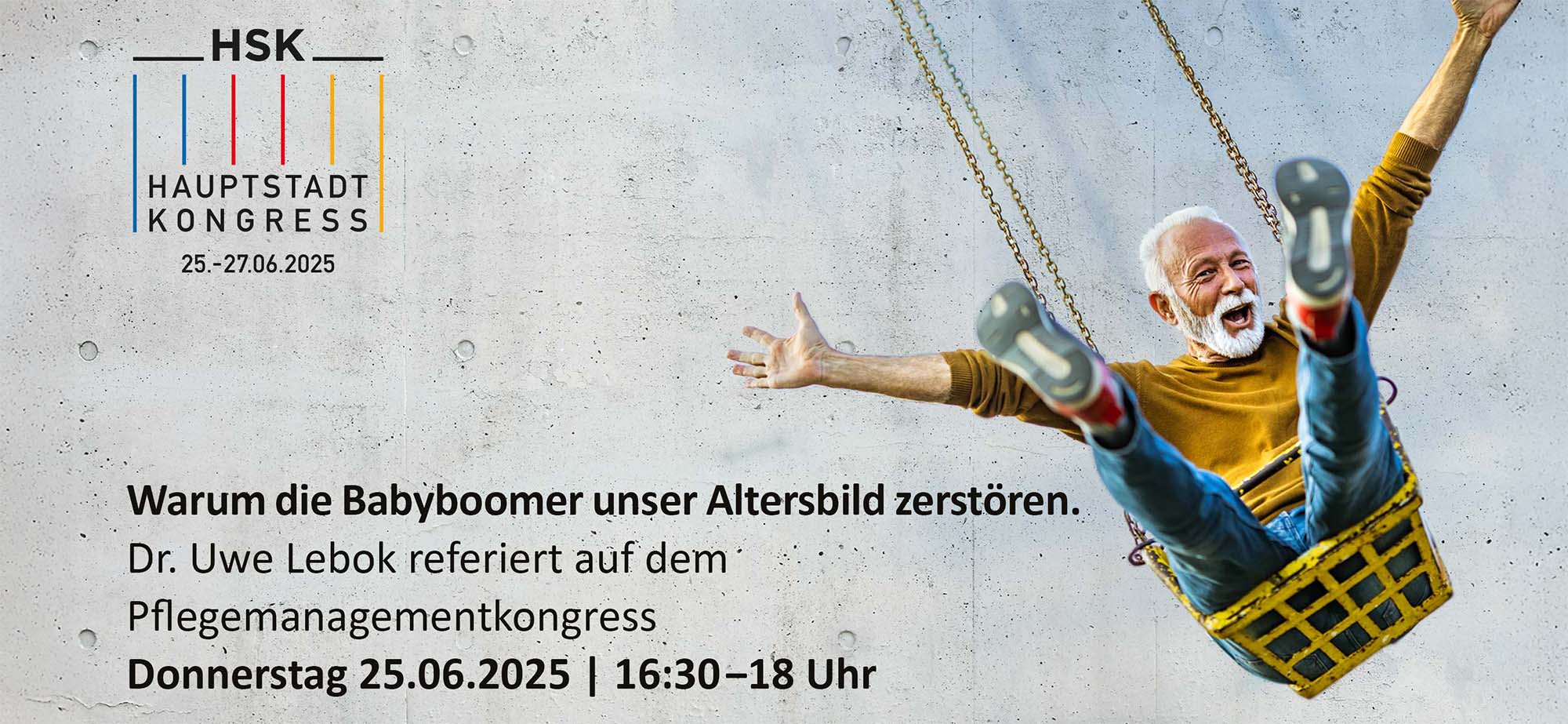 Mann mit weißem Bart freut sich in Kettenkarussell.